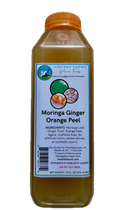 Bottle of Moringa Ginger Orange Peel herbal tea with label on a green background