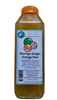 Bottle of Moringa Ginger Orange Peel herbal tea with label on a green background