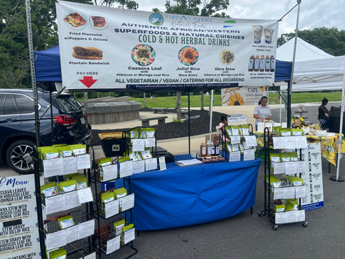 Vincent Farms Natural Foods herbal teas displayed at a local market stall. Papaya Leaf Herbal Tea. Caffeine-Free. Nutrient and Antioxidant Rich. Contains papain