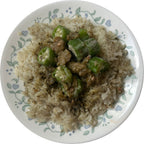 Plated okra stew served over hibiscus, moringa, or jollof rice — authentic West African ready-to-eat meal by Vincent Farms Natural Foods